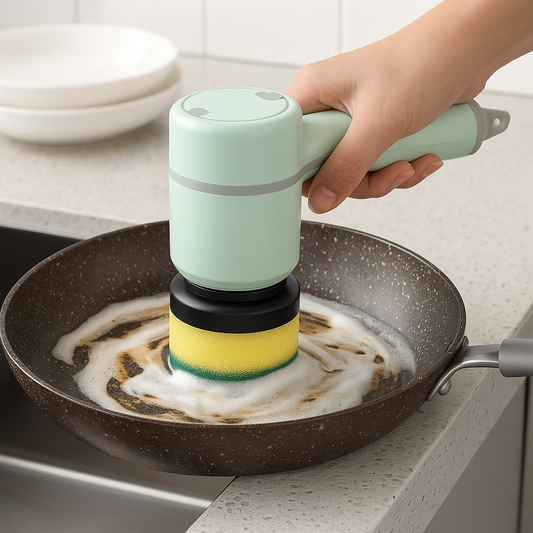 Electric cleaning brush scrubbing a dirty pan with foam